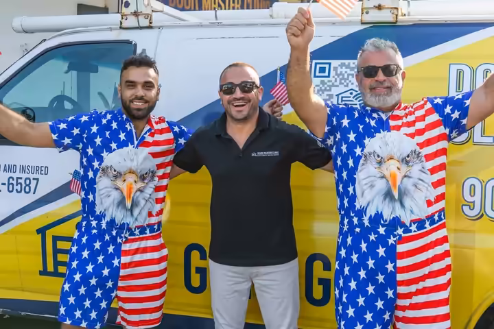 Local business partners celebrating in front of their service van