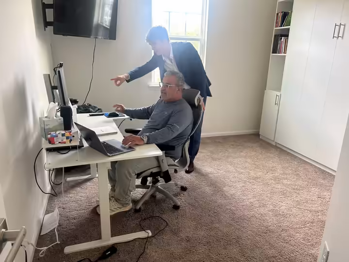 The Sunscreen Digital team working together at a desk